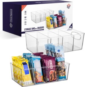 Clear plastic pantry storage bins with removable dividers organizing snacks and pantry essentials