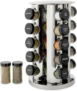 Kamenstein revolving stainless steel spice rack with 20 glass spice jars displayed on a modern kitchen countertop.