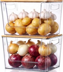ClearSpace clear pantry storage bins with bamboo lids for organizing potatoes, onions, garlic, snacks, and pantry essentials.