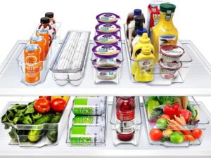 ClearSpace clear refrigerator organizer bins with built-in handles for organizing drinks, fruits, vegetables, yogurt, and pantry items.